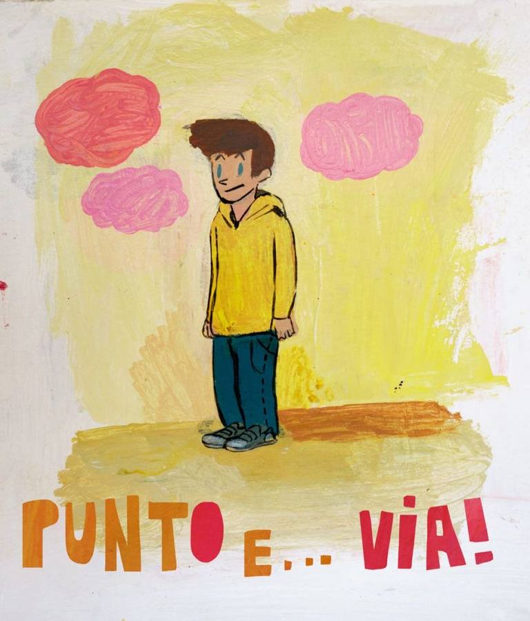 Luca in piedi nel suo mondo giallo, sotto la scritta Punto e… Via!